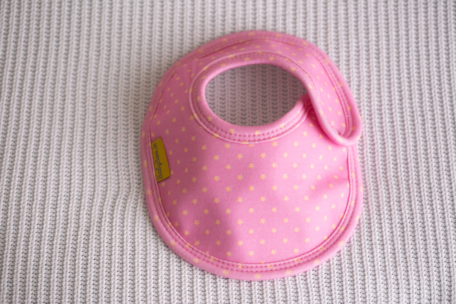 Pink with sunshine stars organic cotton LittleBoo baby bib