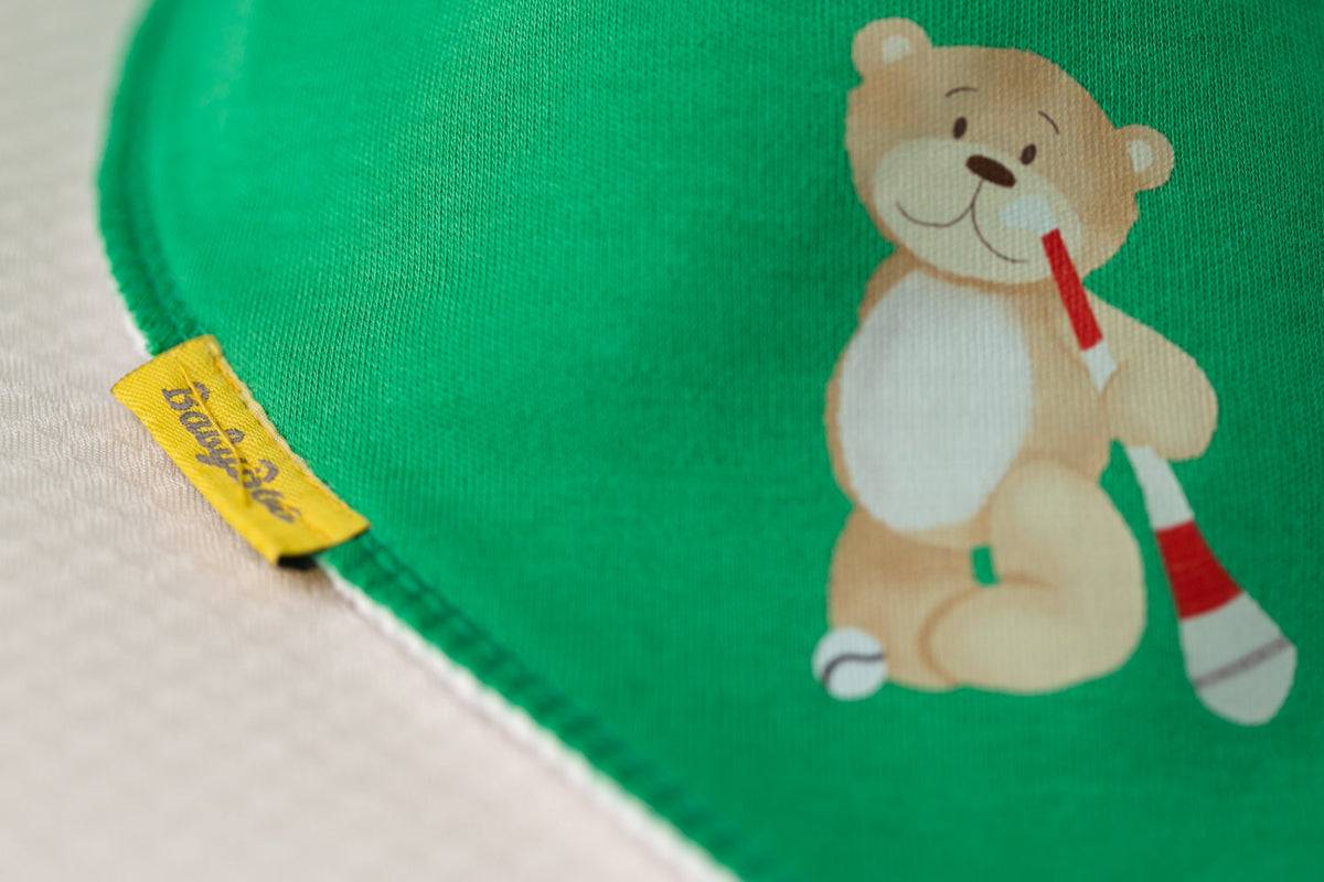 Puc about with Teddy organic cotton DribbleBoo bandana bib