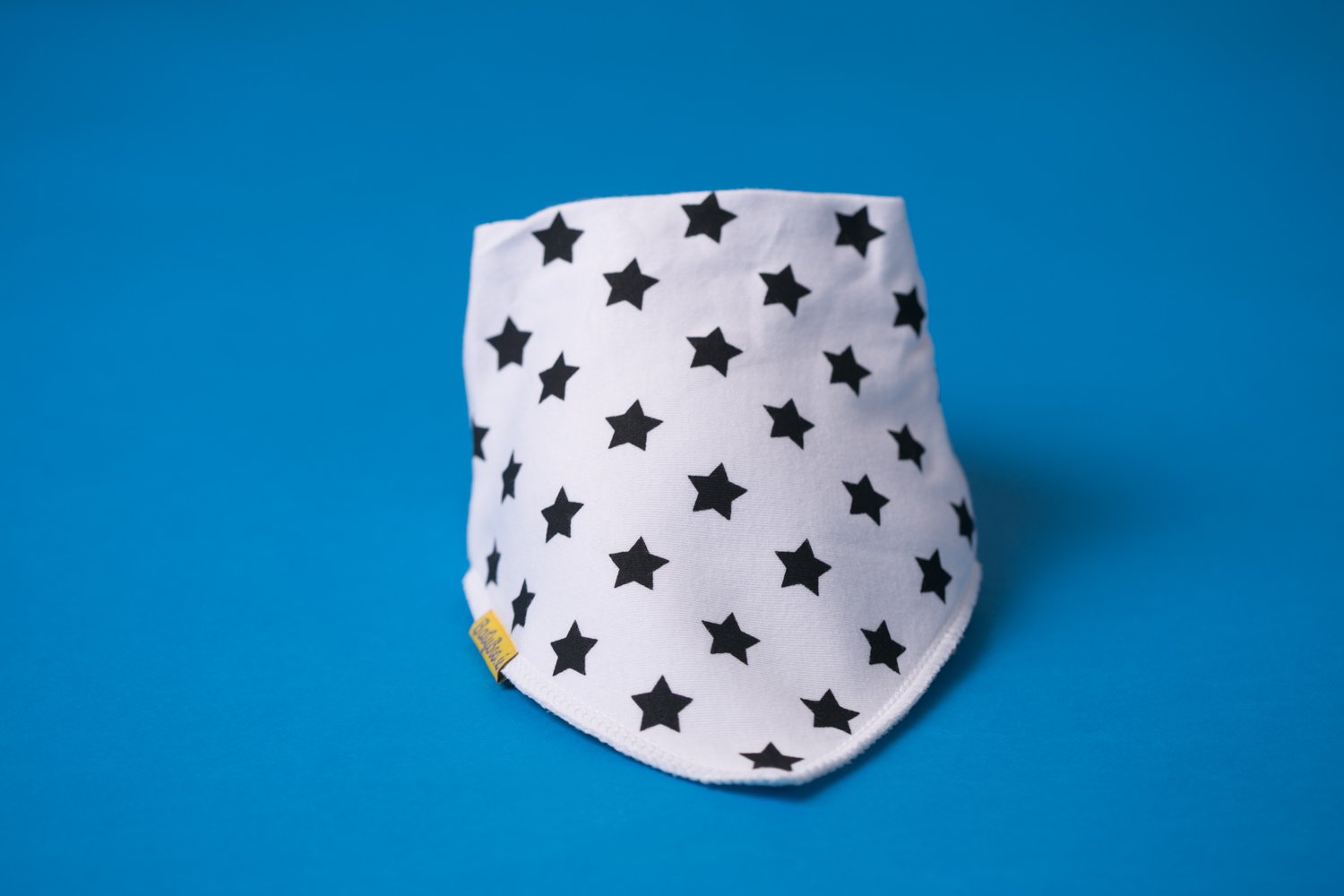 White with black stars organic cotton DribbleBoo bandana bib