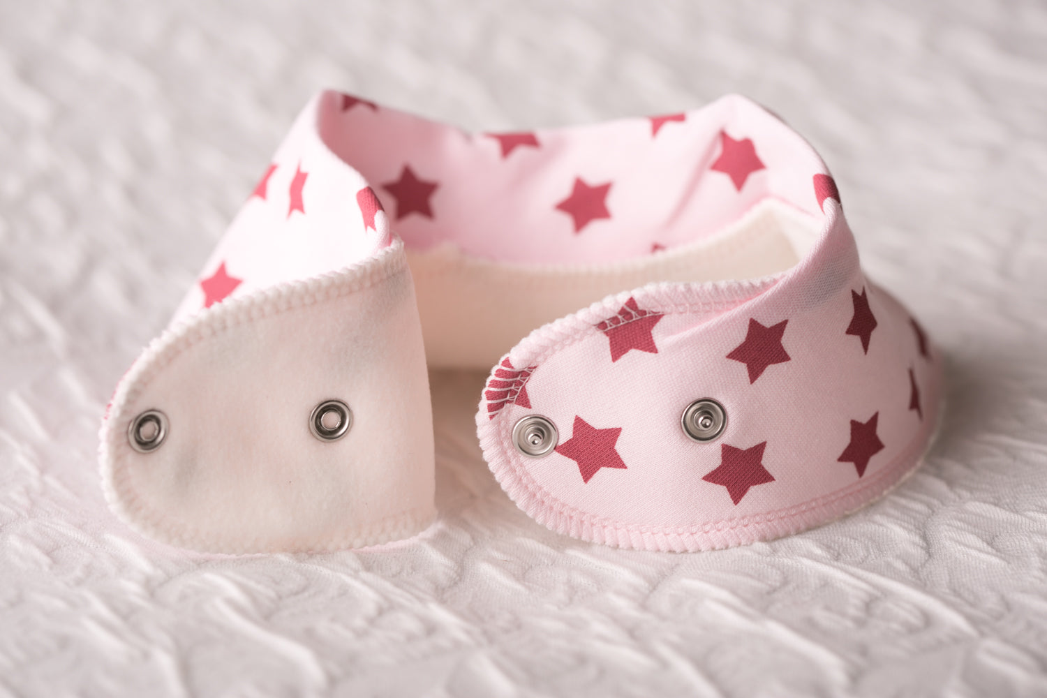 Berry stars on baby pink bandana bib
