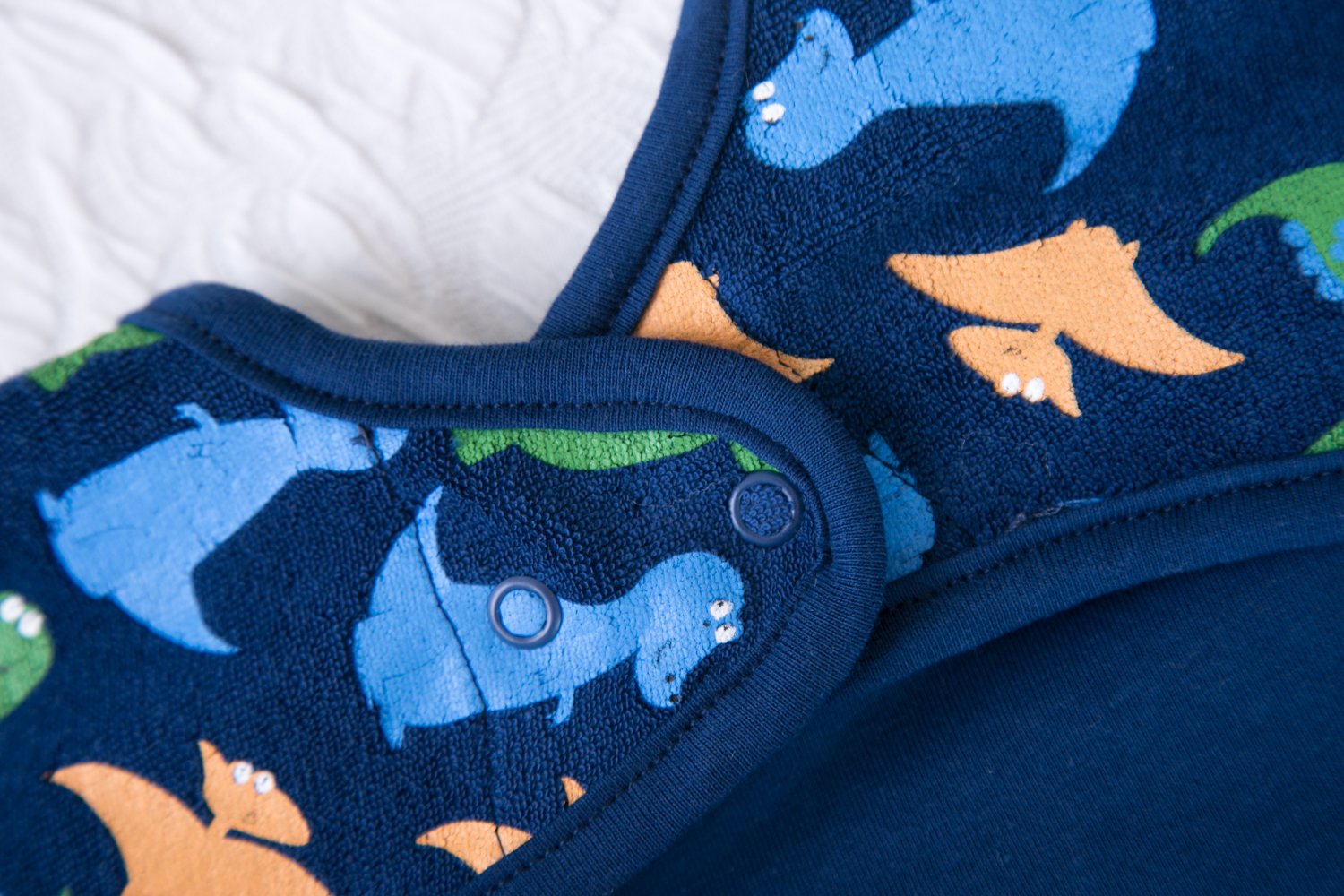 Navy dinos YummyBoo feeding bib