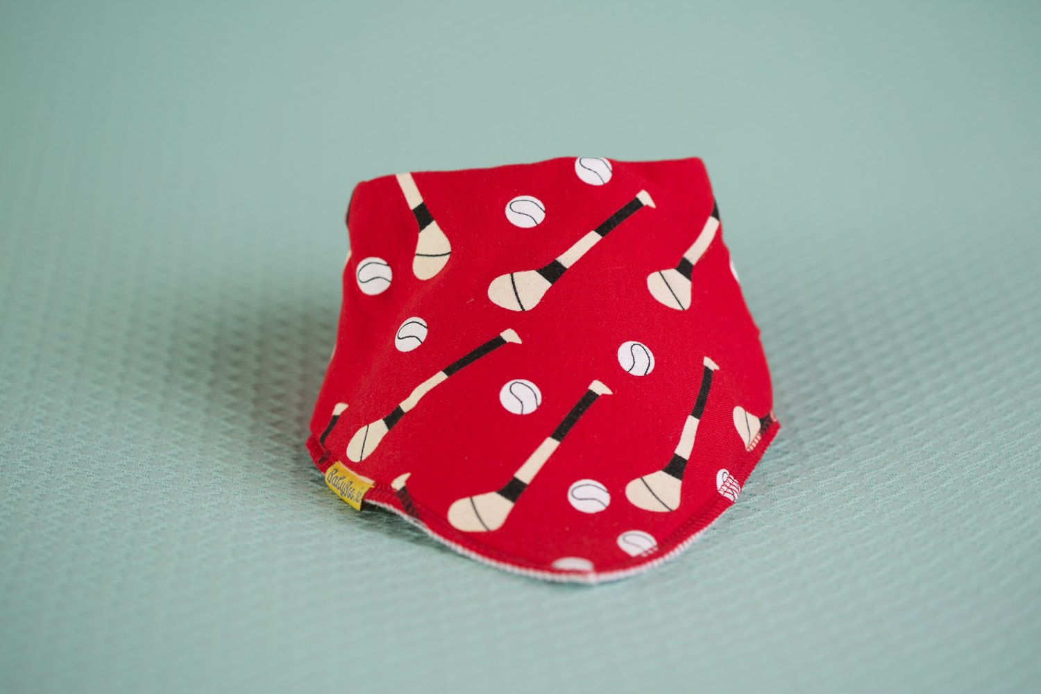 Red GAA mad organic cotton DribbleBoo bandana bib