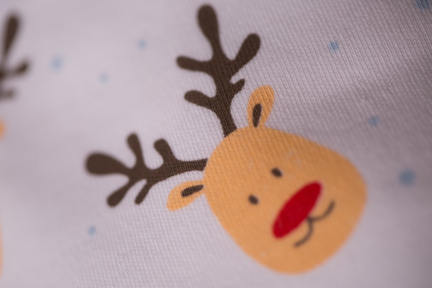 White reindeer everywhere organic cotton DribbleBoo bandana bib