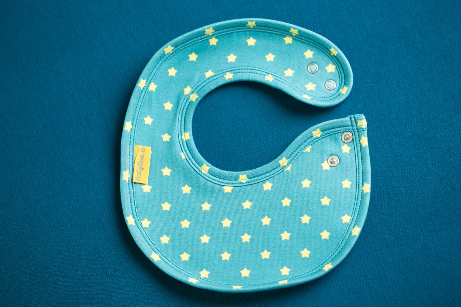 Teal and sunshine stars organic cotton LittleBoo baby bib