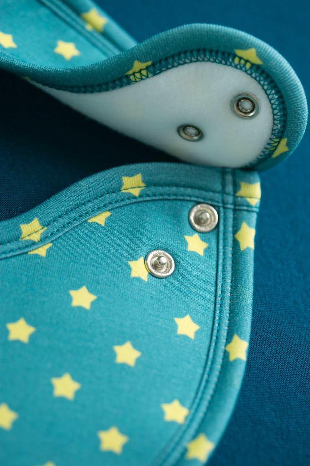 Teal and sunshine stars organic cotton LittleBoo baby bib