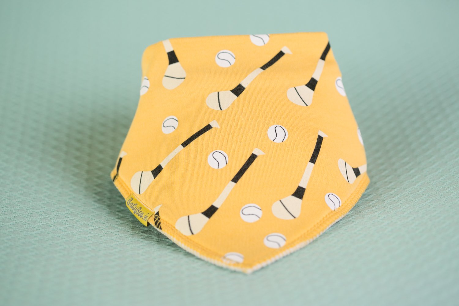 Yellow GAA mad organic cotton DribbleBoo bandana bib