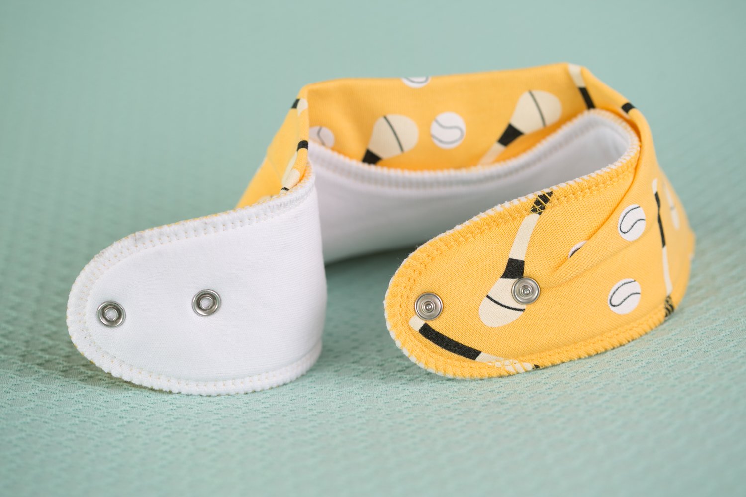 Yellow GAA mad organic cotton DribbleBoo bandana bib