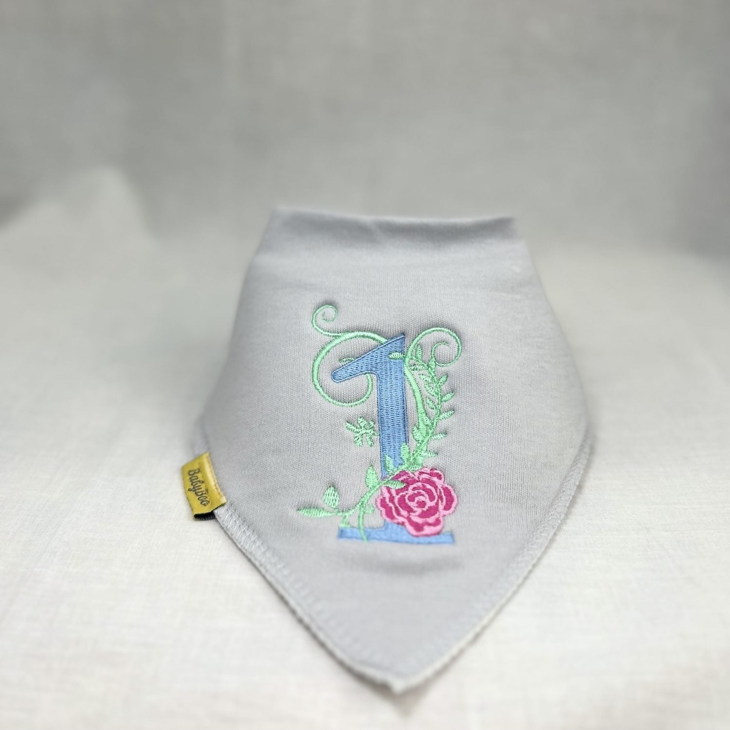 First birthday roses organic cotton Dribbleboo bandana bib