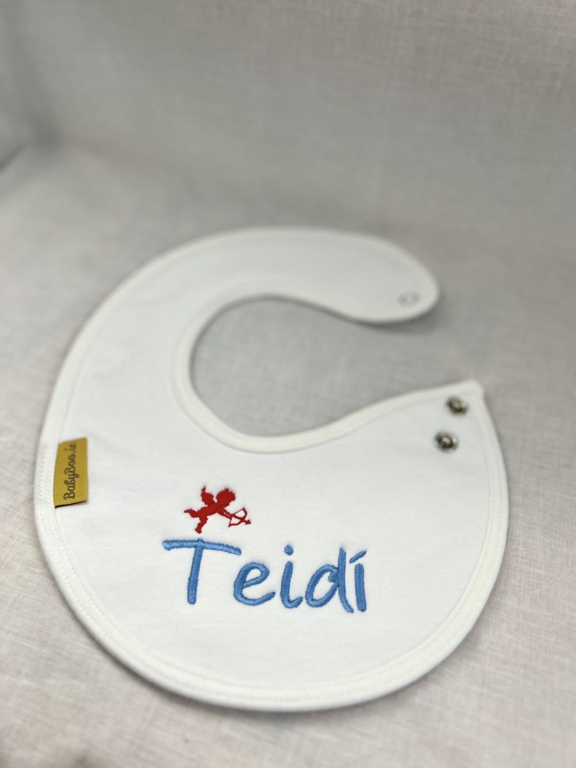 Cupid and name organic cotton LittleBoo newborn bib
