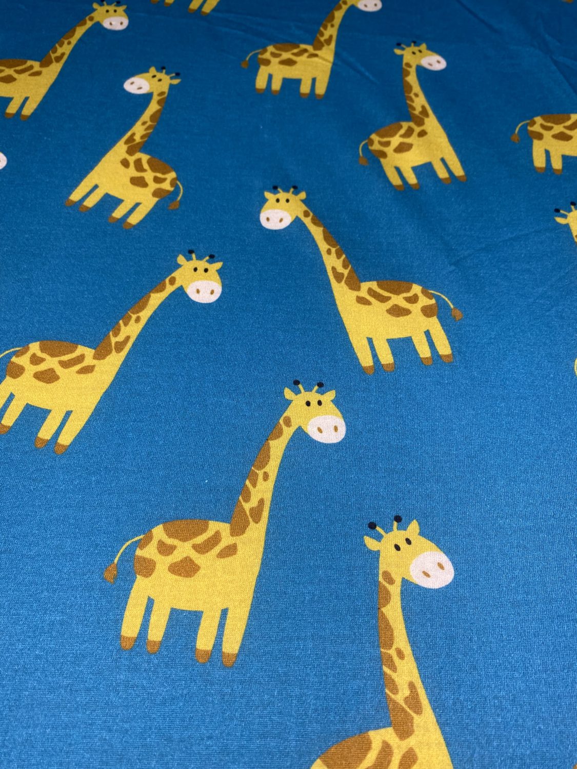 Teal Gerry giraffe organic cotton BeddyBoo fitted sheet