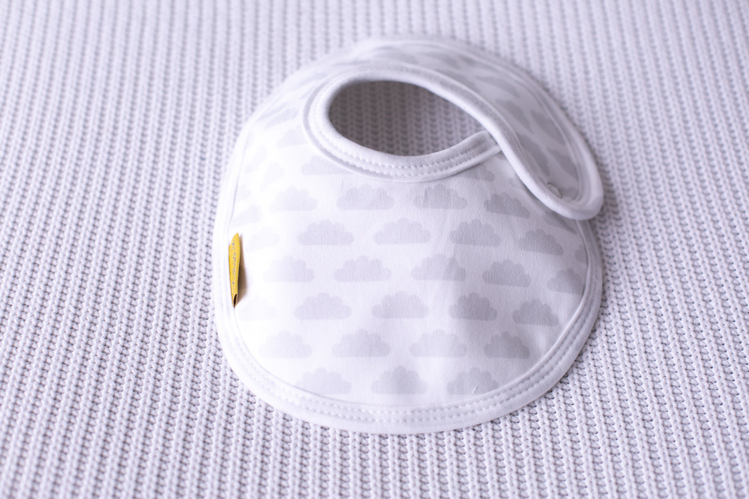 White with grey clouds organic cotton LittleBoo baby bib