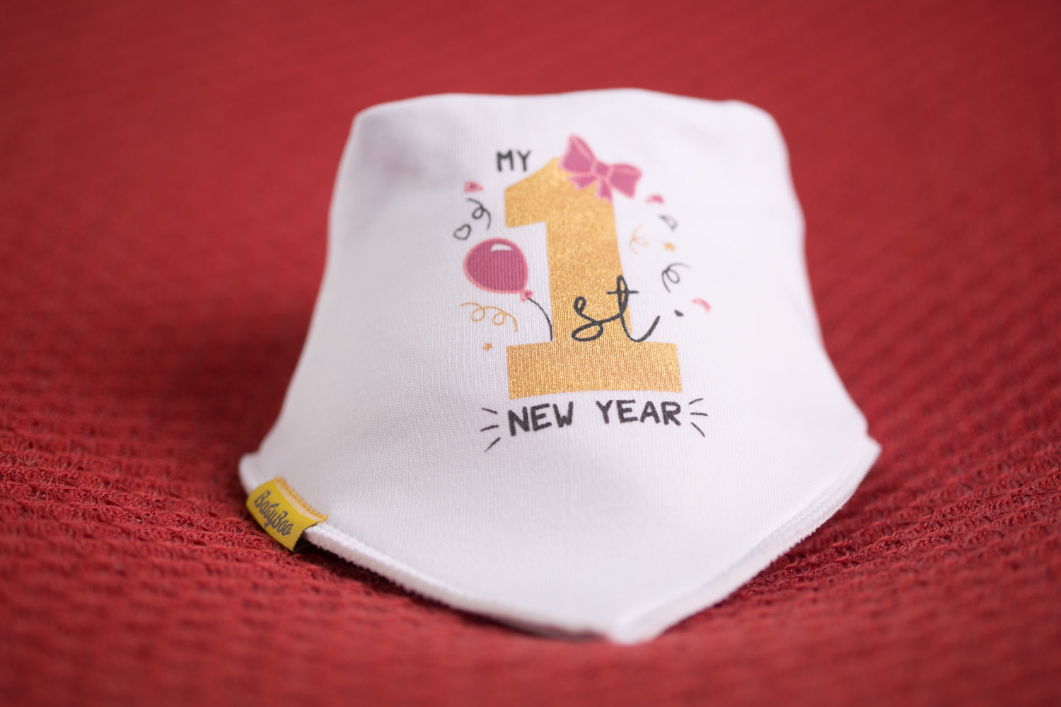Her first New Years organic cotton DribbleBoo bandana bib