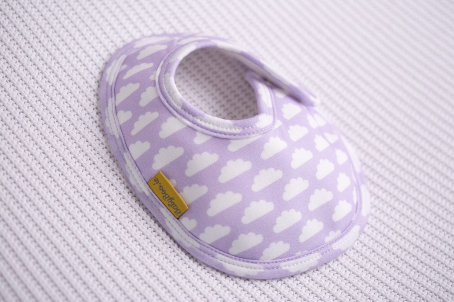 Lilac with white clouds organic cotton LittleBoo baby bib