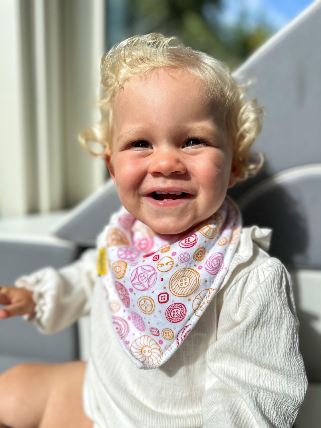 Pink buttons organic cotton DribbleBoo bandana bib