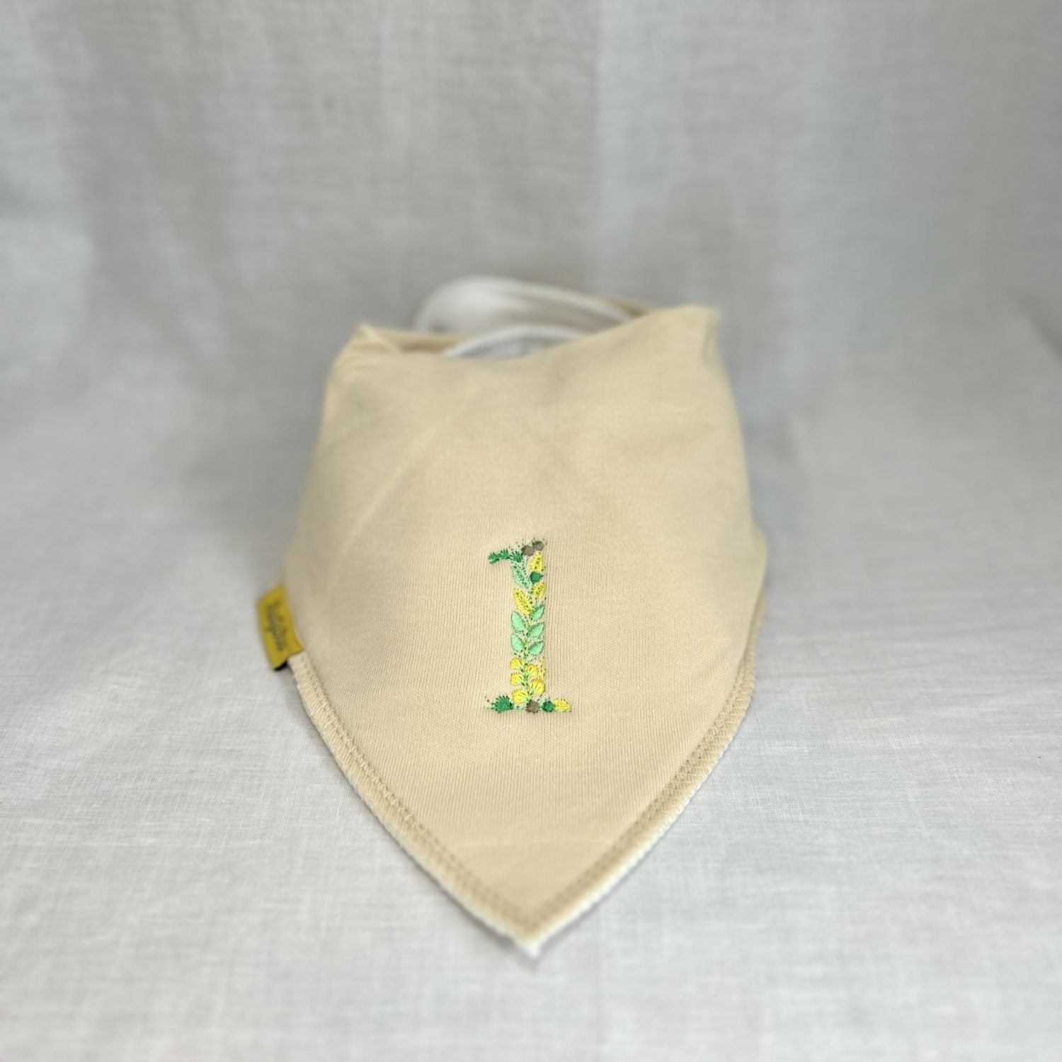 First birthday floral organic cotton Dribbleboo bandana bib