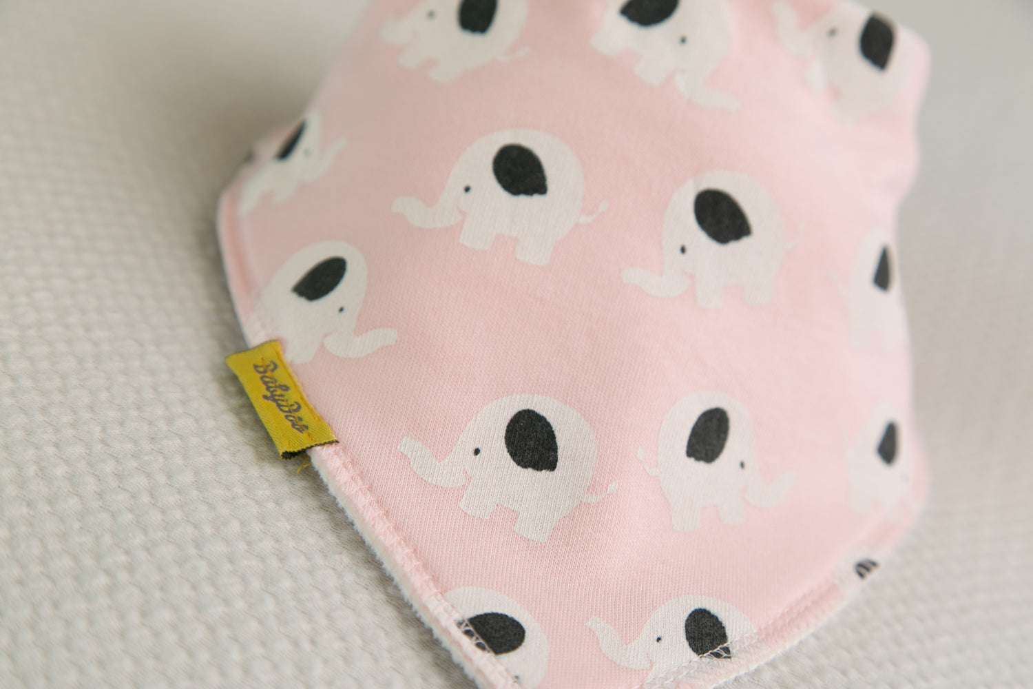Baby pink Ellie Elephant organic cotton DribbleBoo bandana bib