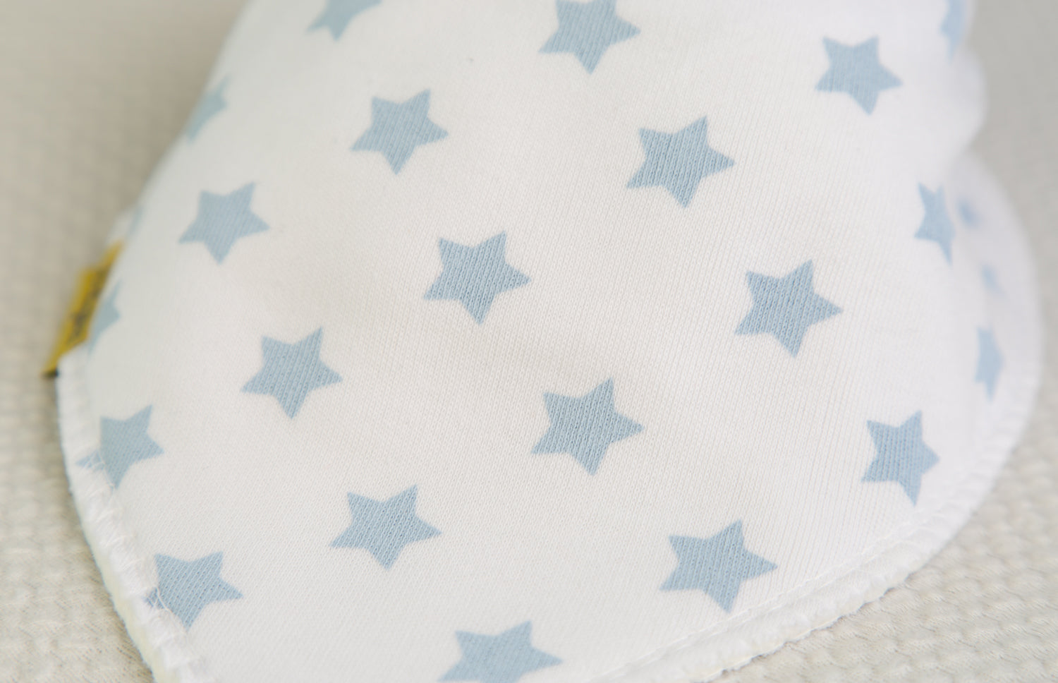 White with baby blue stars organic cotton DribbleBoo bandana bib