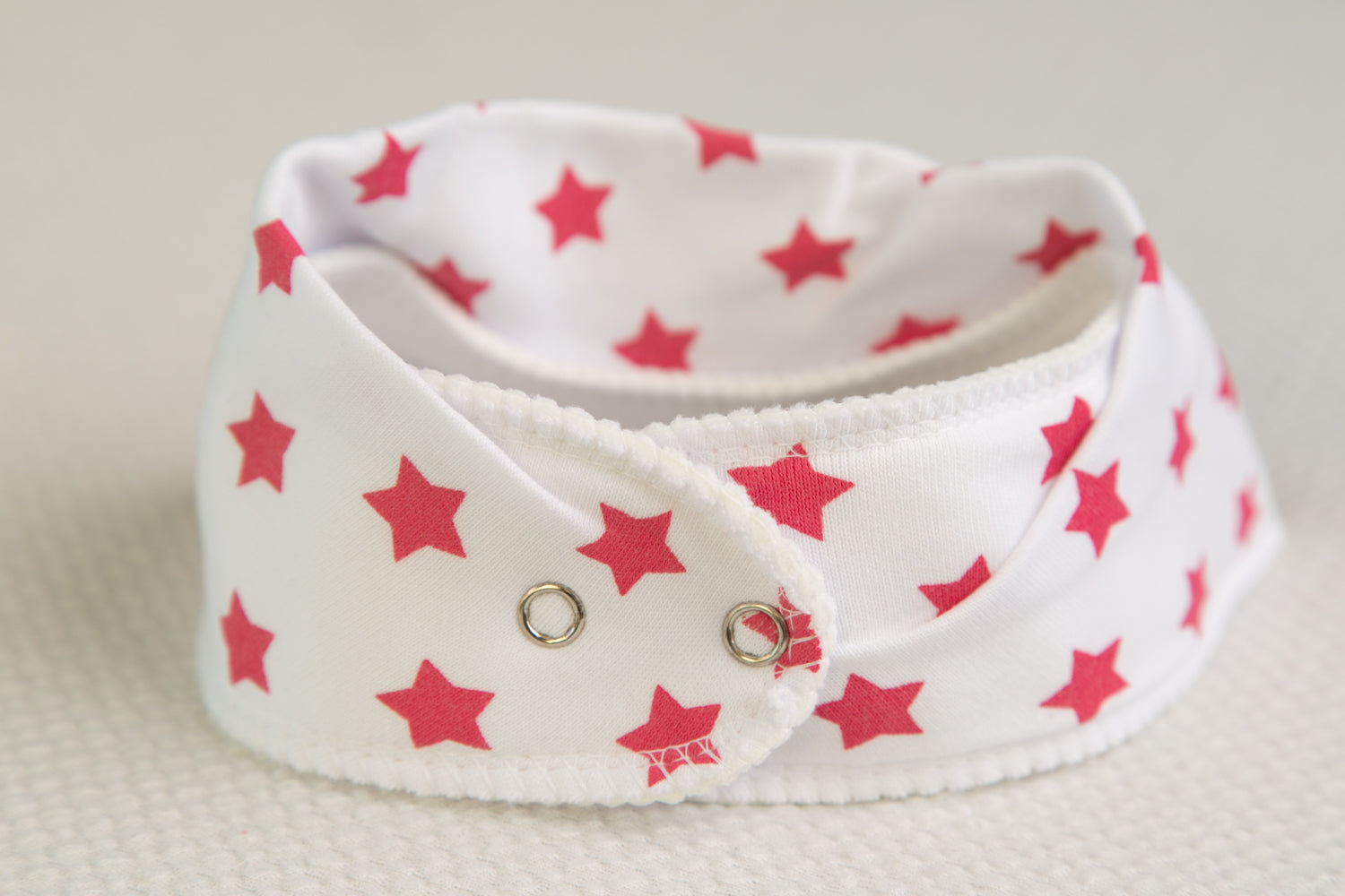 White with hot pink stars organic cotton DribbleBoo bandana bib