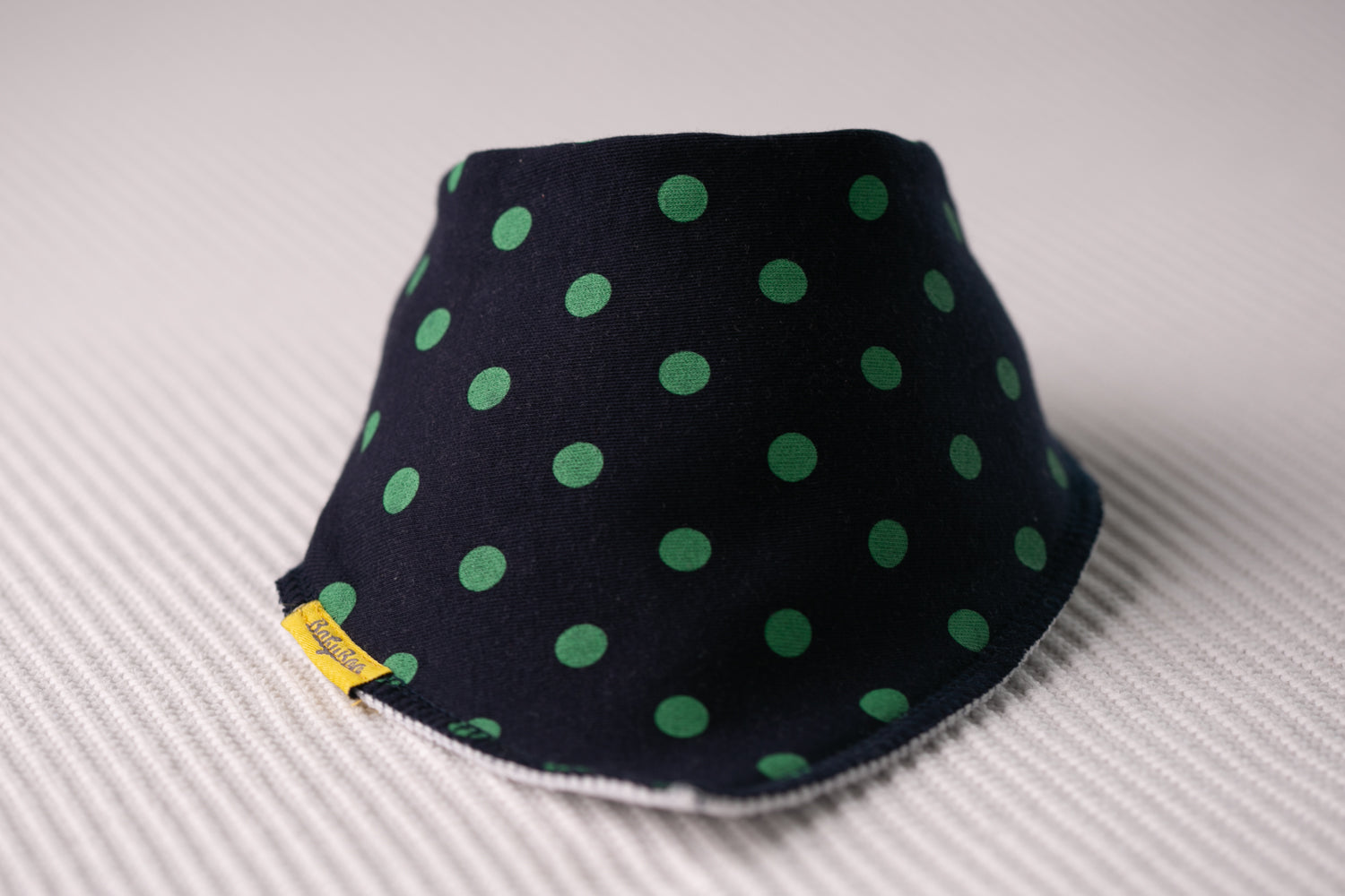 Navy with green polka organic cotton DribbleBoo bandana bib