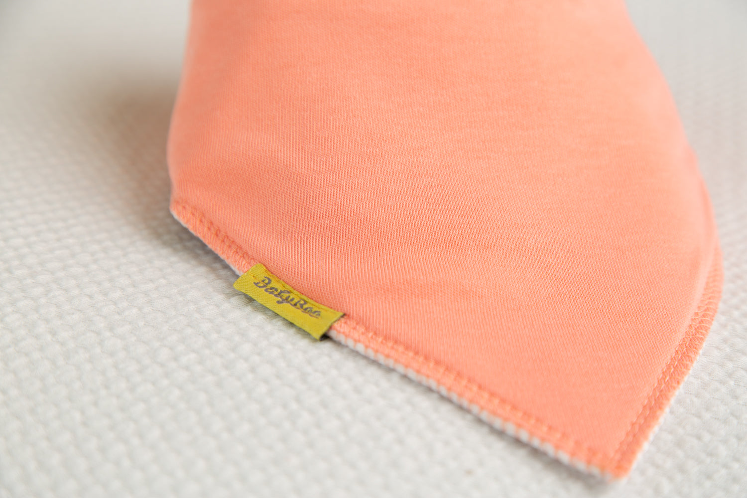 Just coral organic cotton DribbleBoo bandana bib