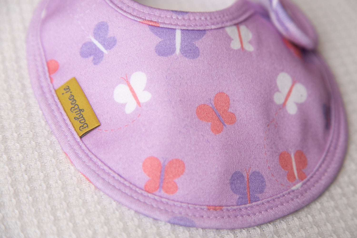 Lilac Butterfly organic cotton LittleBoo baby bib