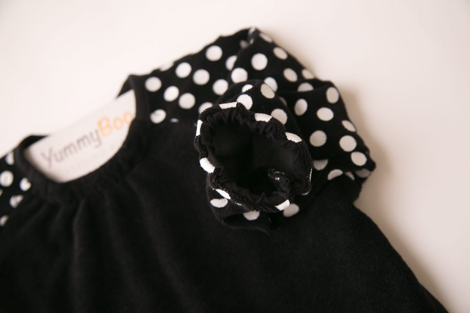 Monochrome dotty YummyBoo feeding bib