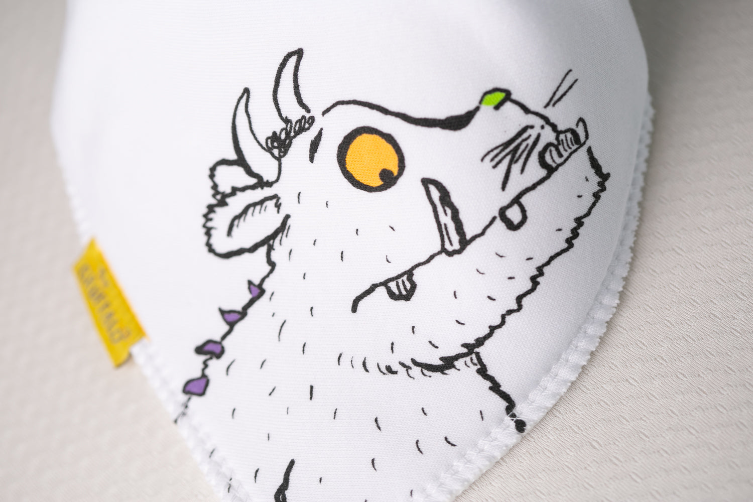 His eyes are orange Organic cotton DribbleBoo bandana bib