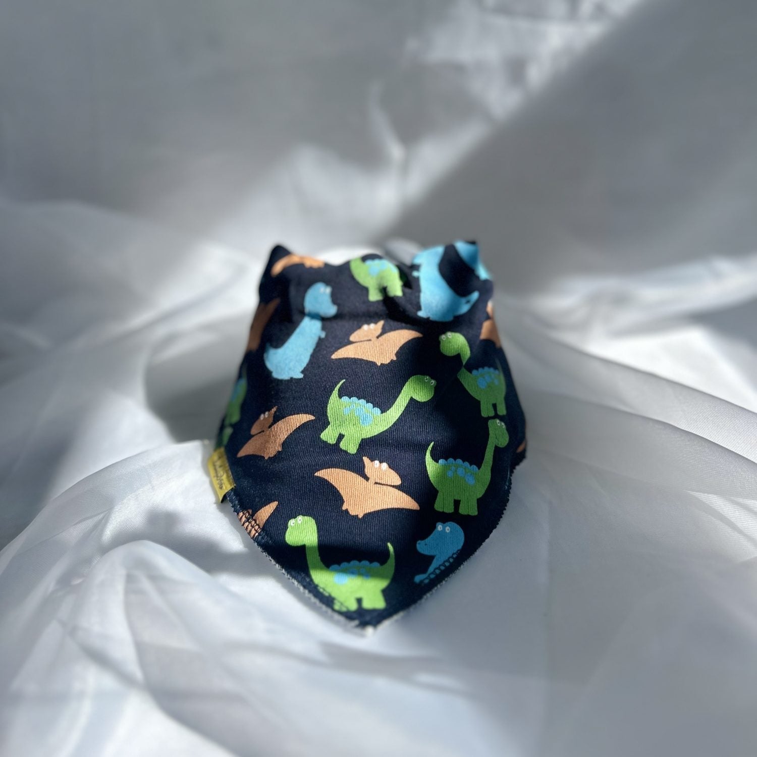Navy dinos everywhere organic cotton DribbleBoo bandana bib