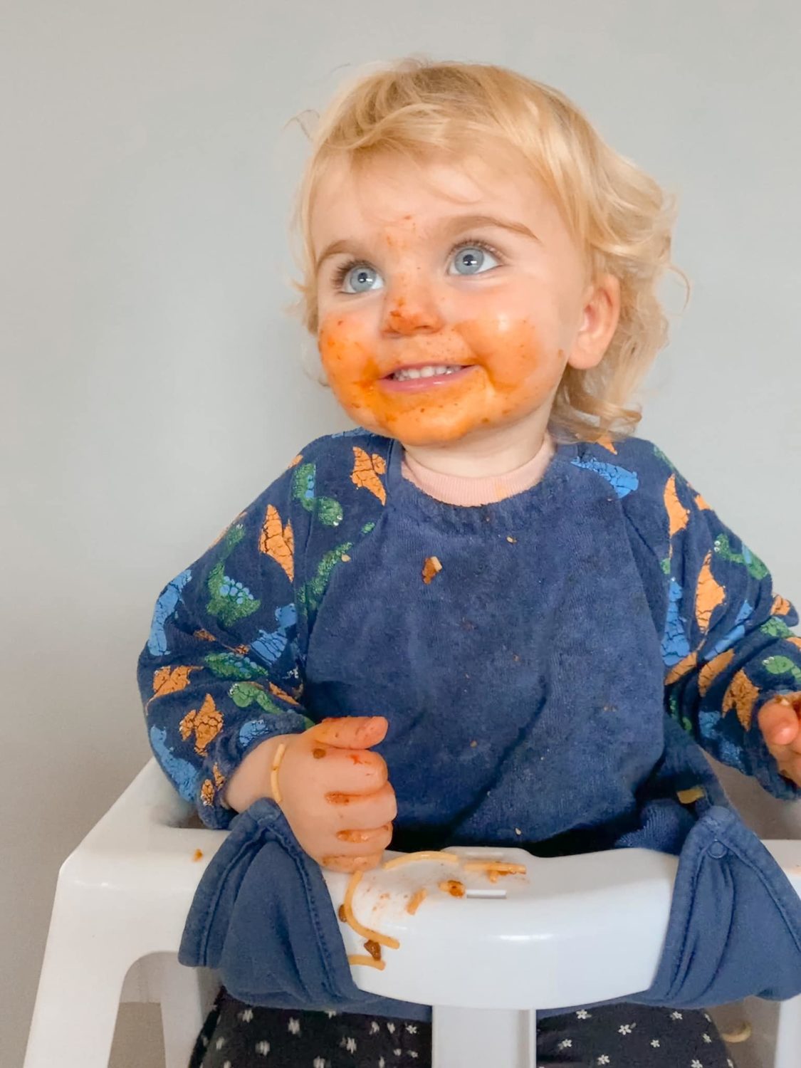 Navy dinos YummyBoo feeding bib