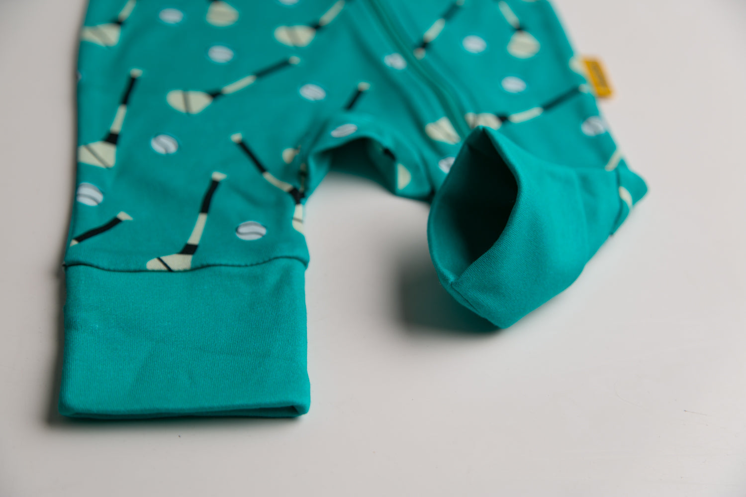 Teal GAA organic cotton ZippyBoo suit