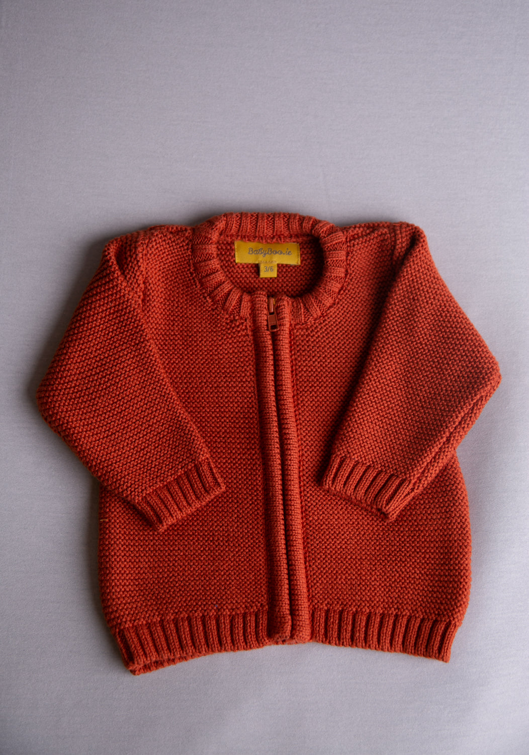Rust organic cotton zipped cardigan