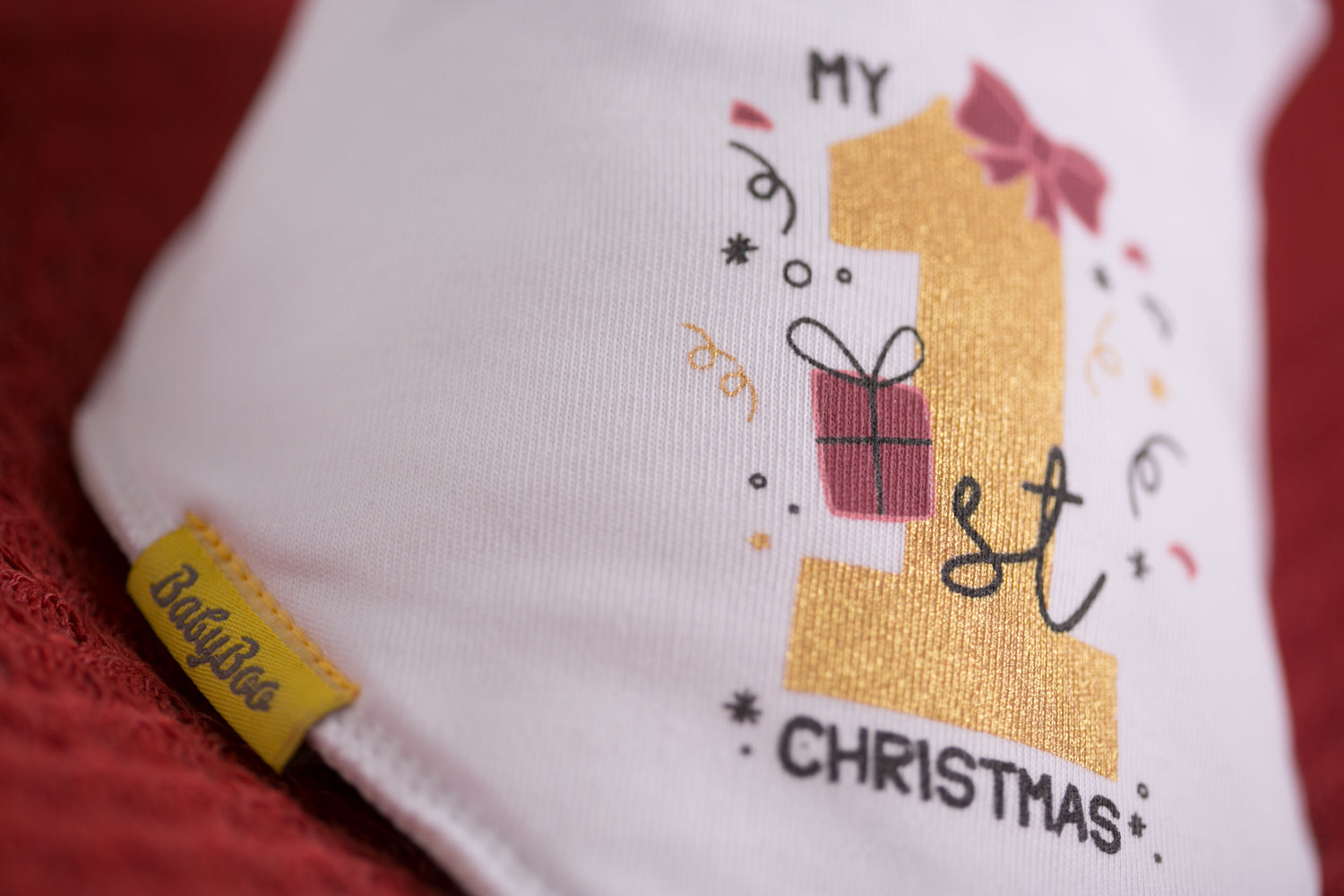 Her first Christmas organic cotton DribbleBoo bandana bib