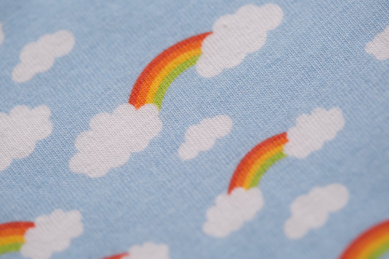 Rainbows and clouds organic cotton LittleBoo baby bib