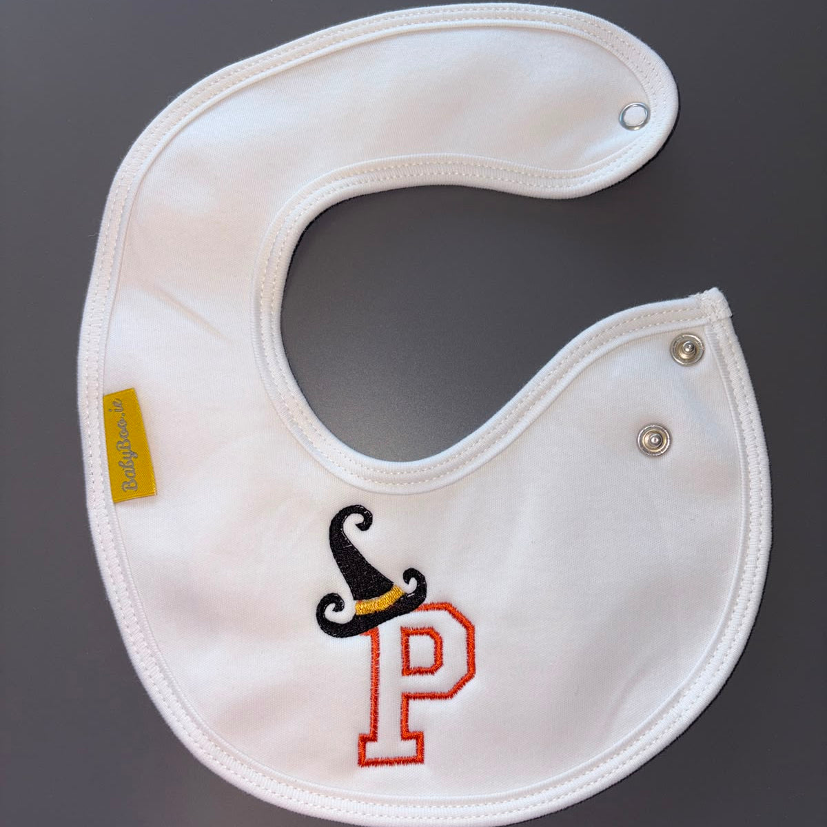 Letterman with witches hat organic cotton LittleBoo newborn bib