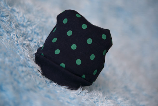 navy with green polka beanie hat