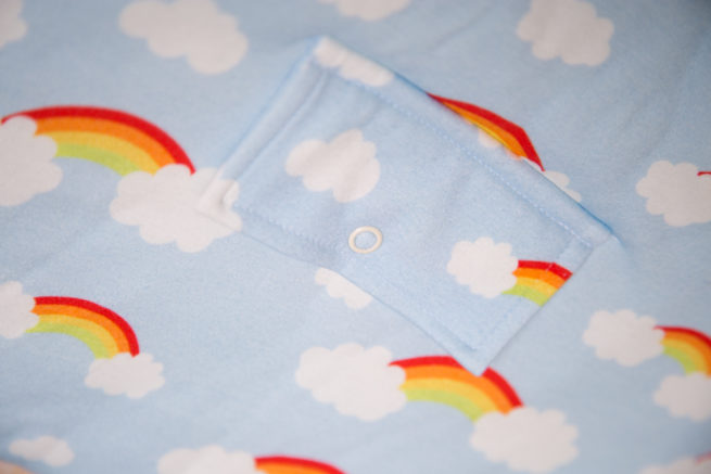 Rainbows and clouds snuggle boo