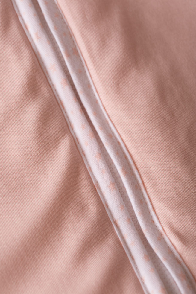 Zip detail peach sleeping bag