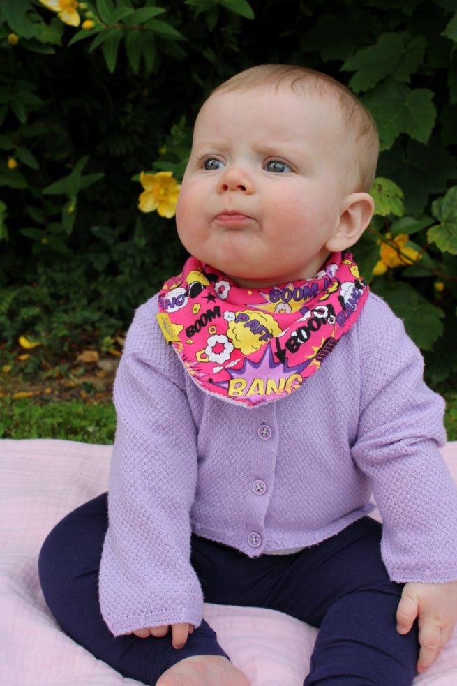 Pink Superhero organic cotton DribbleBoo bandana bib - Image 3