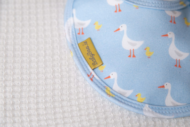 Blue duckies organic cotton LittleBoo baby bib - Image 2