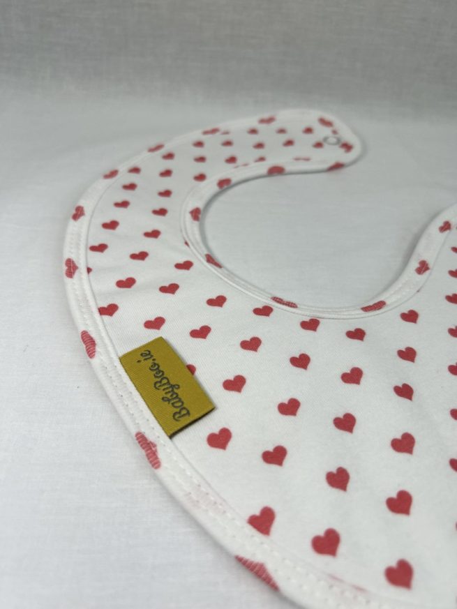 Red love hearts organic cotton LittleBoo baby bib - Image 2