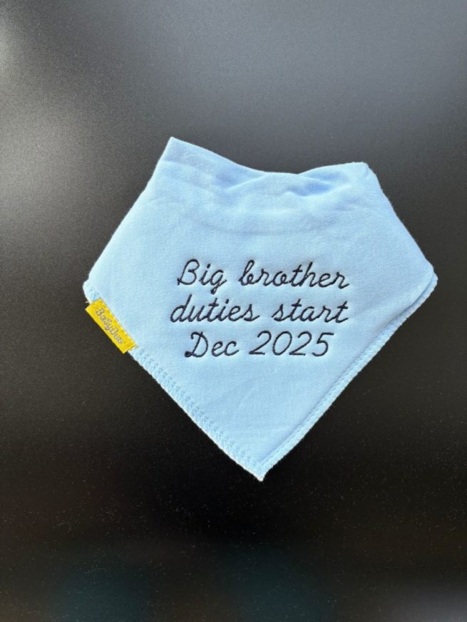 Big brother duties start Dec 2026 organic cotton DribbleBoo bandana bib